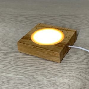 Small size square table lamp made with natural wood.